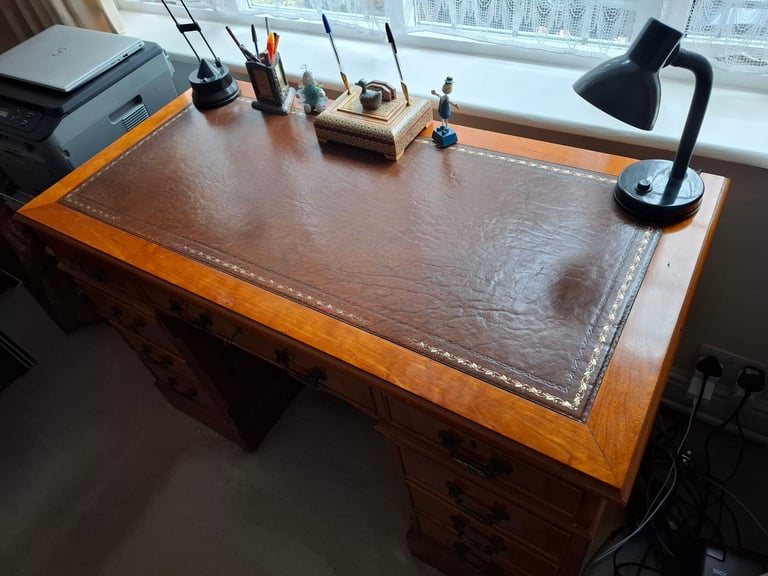 Traditional wooden study desk with leather tip