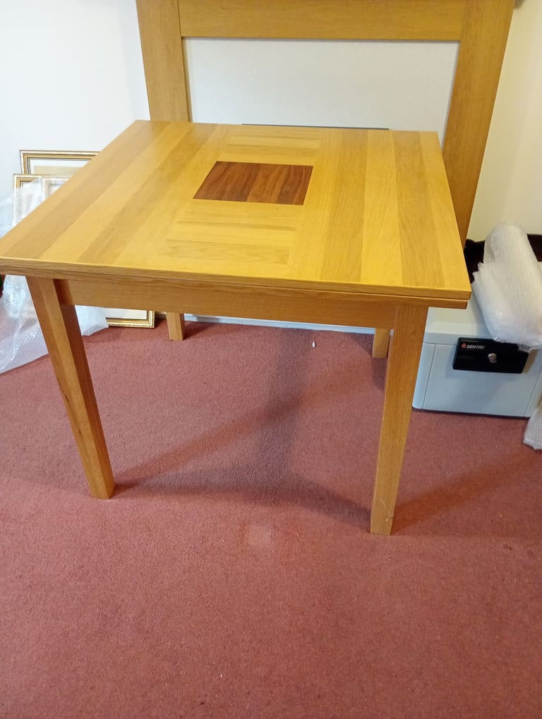 image for Extending dining room table 