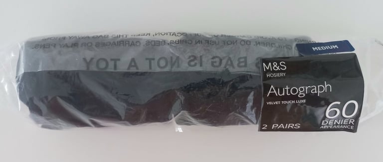 NEW M&S 2 PACK OF NAVY TIGHTS ( PROCEEDS TO GUIDE DOGS )