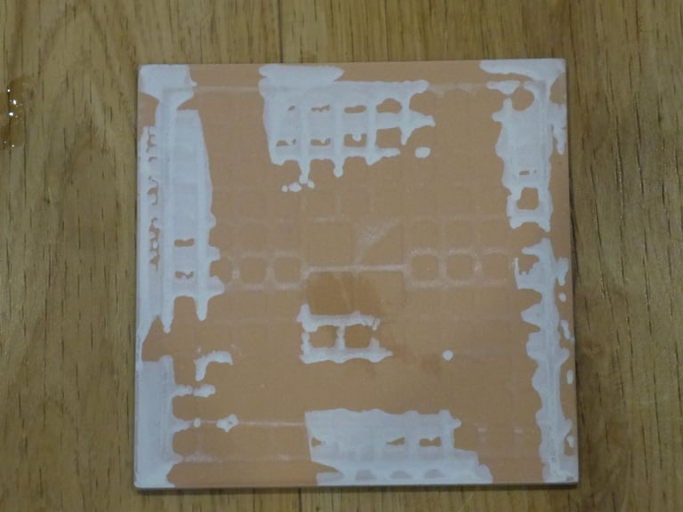 Small white square glazed wall tiles for sale.