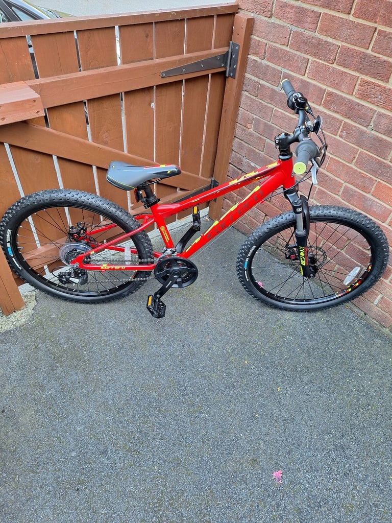 image for Carrera blast red mountain bike 24inch wheels 21 speed disc brakes as new condition 
