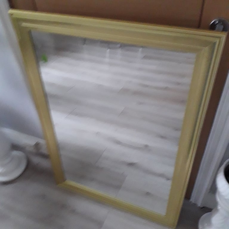 GOLD FRAMED MIRROR, COULD DELIVER.