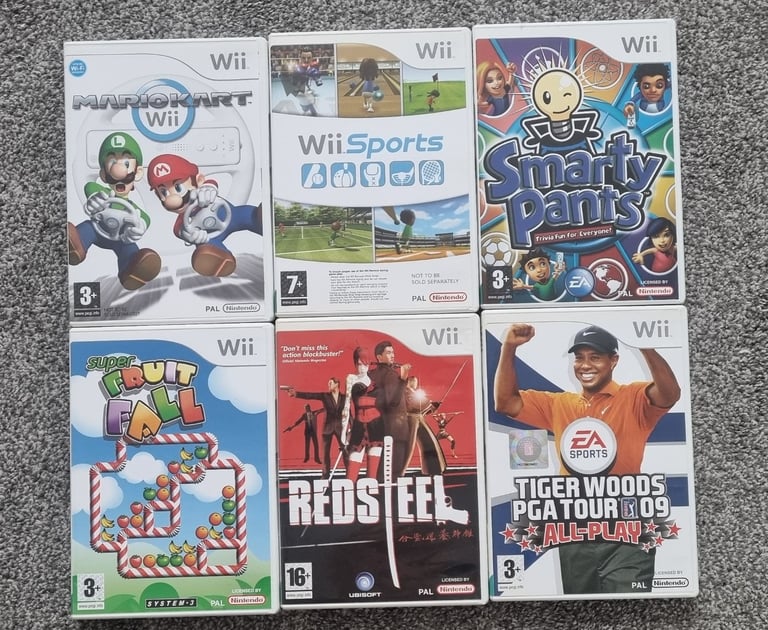 Wii + 6 games Inc mario kart & wii sports 
