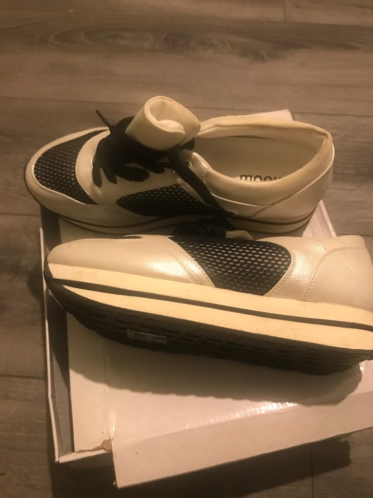 Black and white platform trainers 