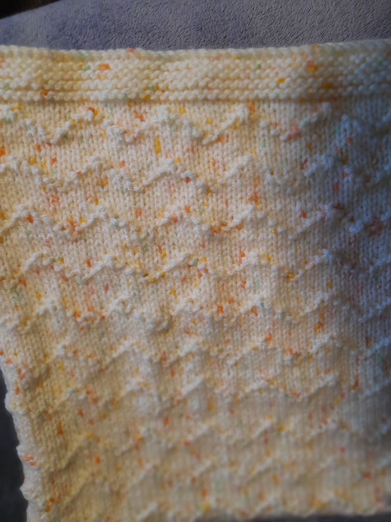 Hand knitted babies blanket 