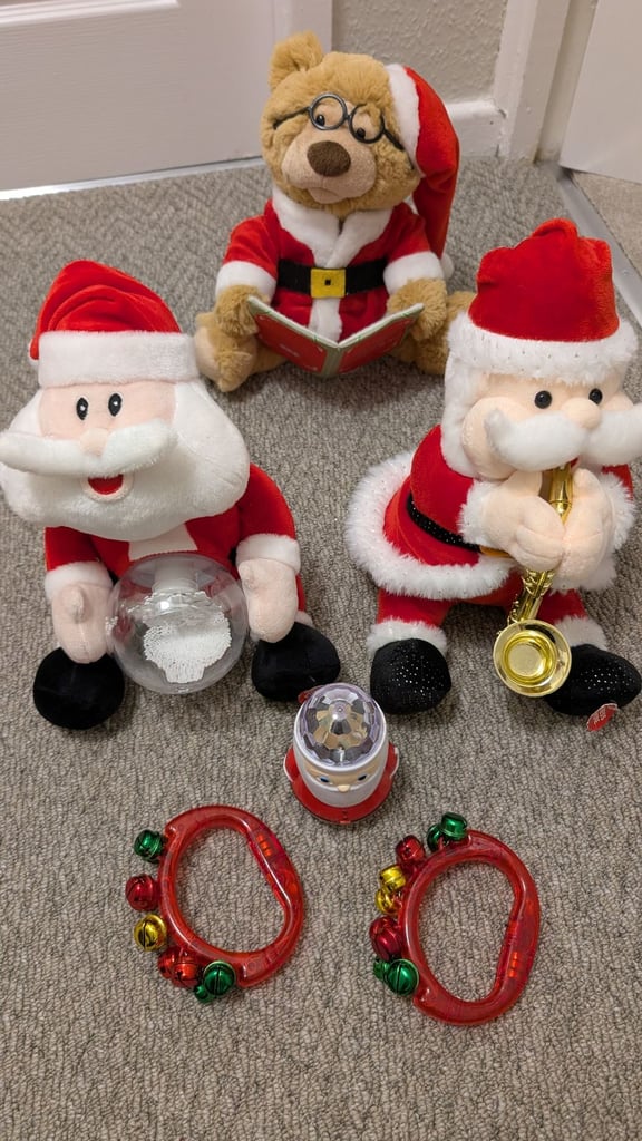 image for 2 singing Santa 