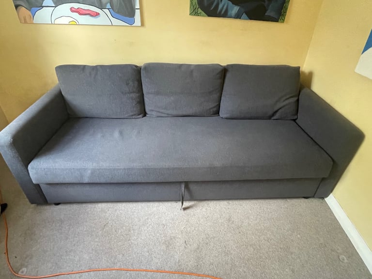 image for IKEA dark blue functional sofa bed