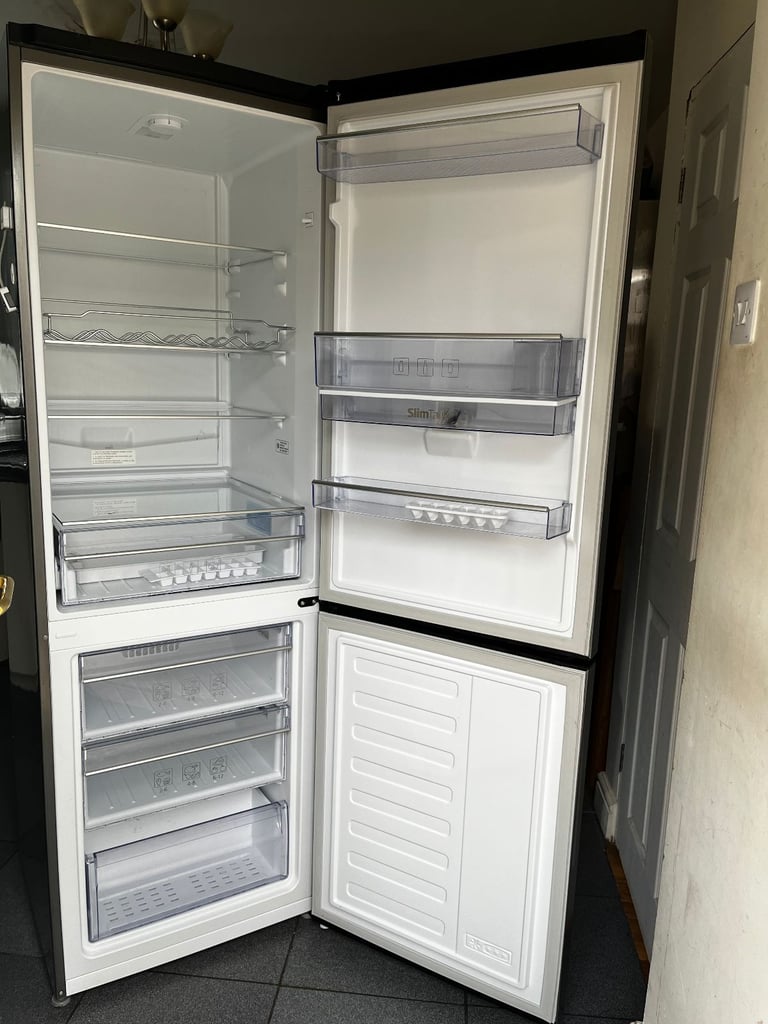 STAINLESS STEEL FROST FREE BEKO FRIDGE FREEZER WITH DRINKS DISPENSER IN GOOD WORKING CONDITION