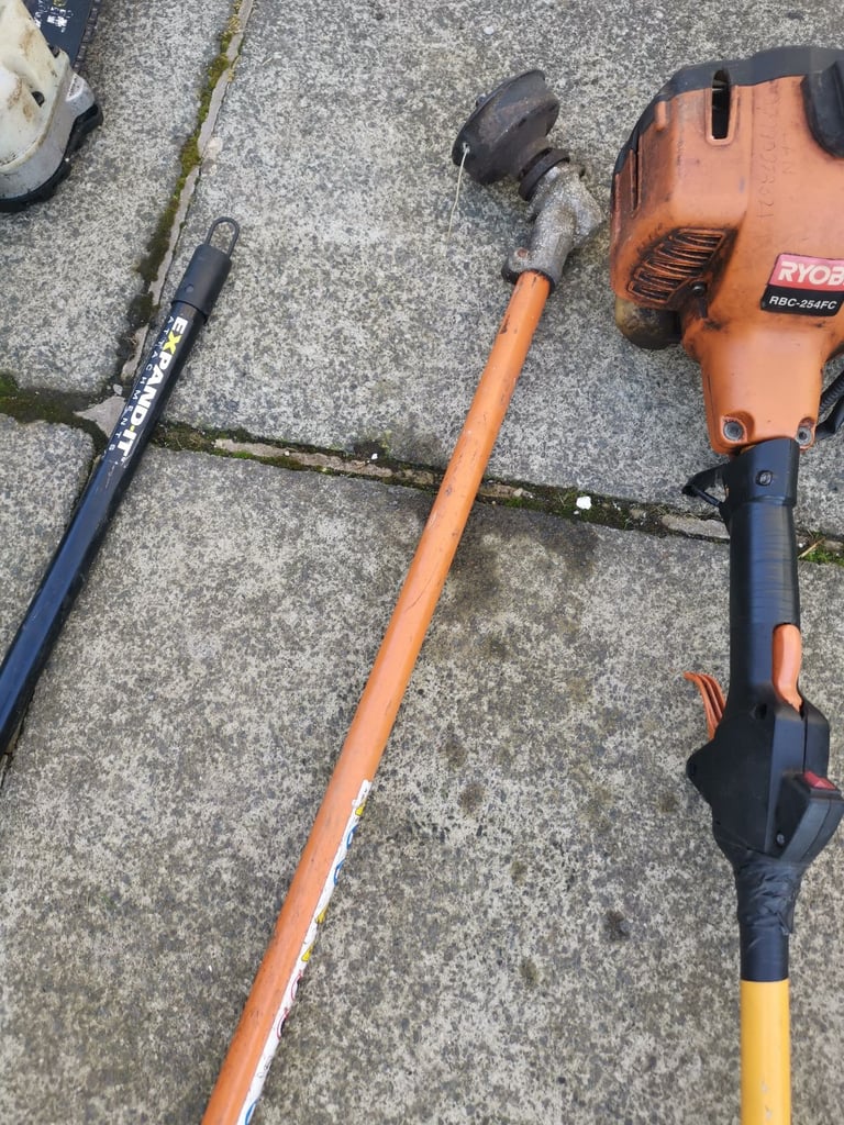 Ryobi 2 stroke strimmer and chainsaw pole saw
