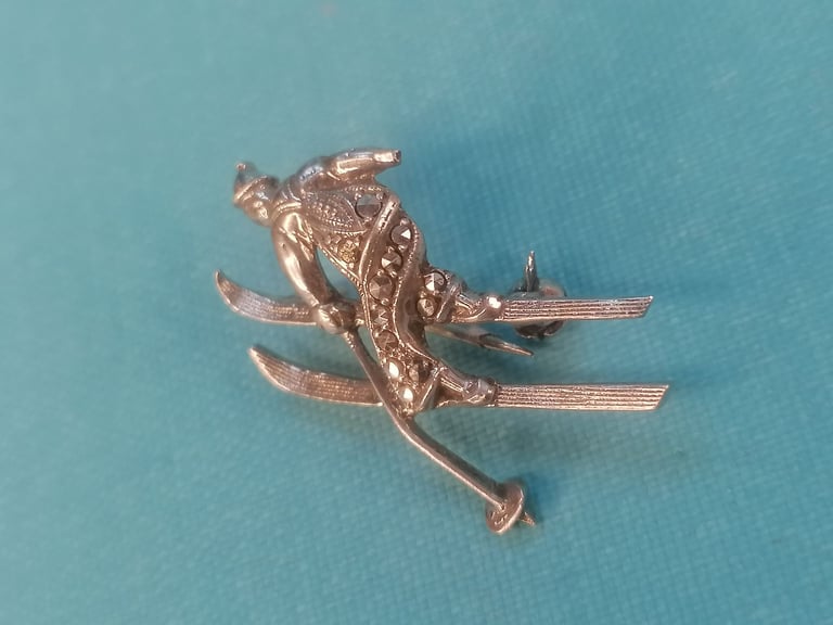 VINTAGE Brooch. Skier in mid - jump. 800  silver brooch. (missing one part as seen).