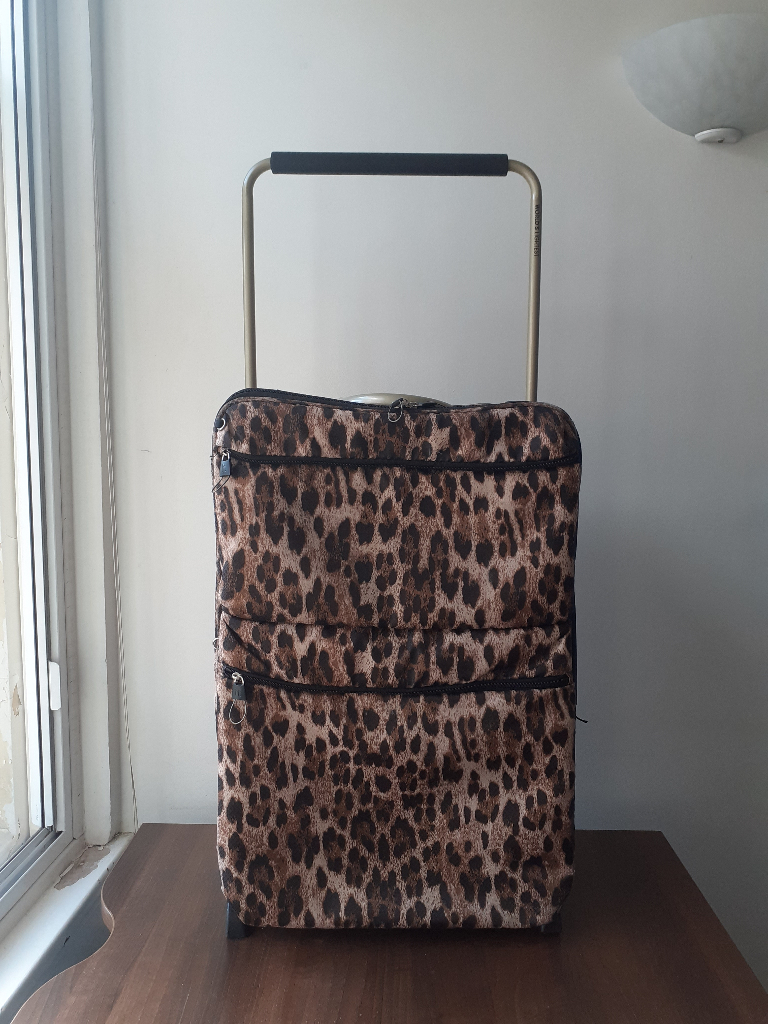 Matching pair of wheeled luggage in leopardskin print - stylish & functional