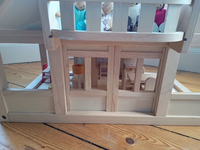 Plan toys wooden dolls house complete with furniture set and dolls, like new condition £120 ono