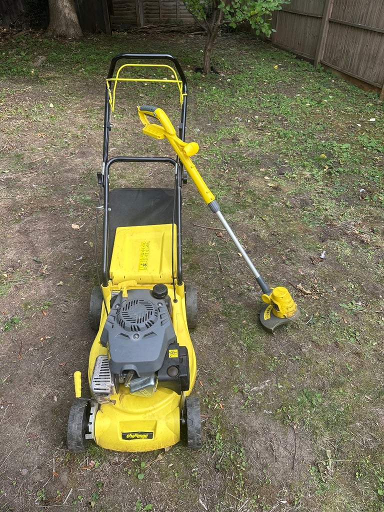 Challenge petrol mower and challenge cordless strimmer with battery and charger 