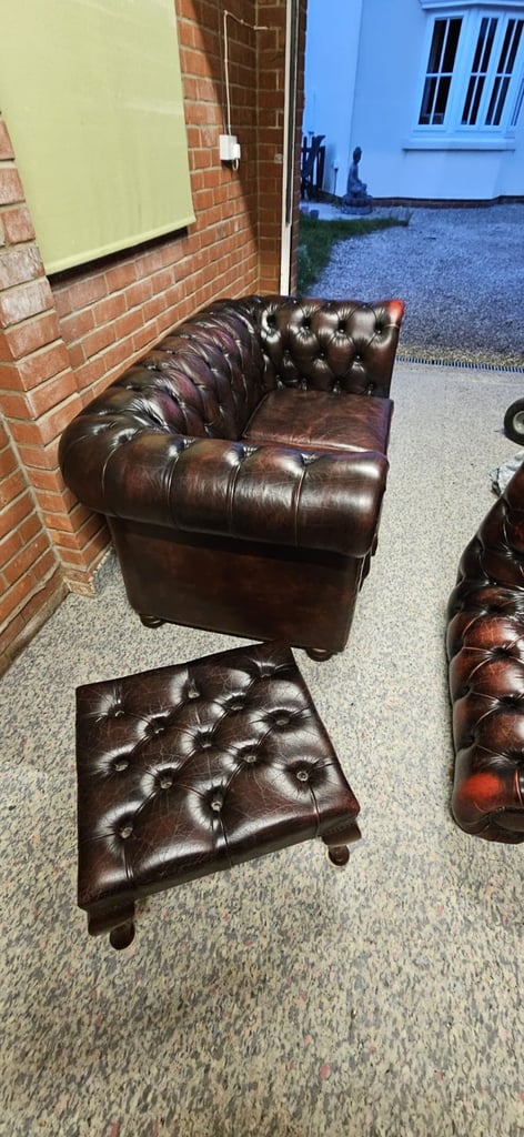 Beautiful vintage 2 seater chesterfield sofa with matching footstool.