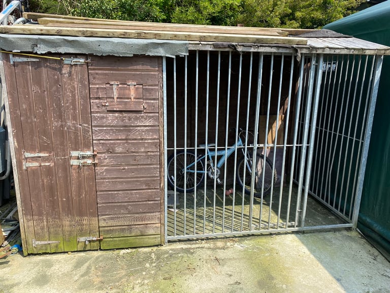 Well loved dog kennel 