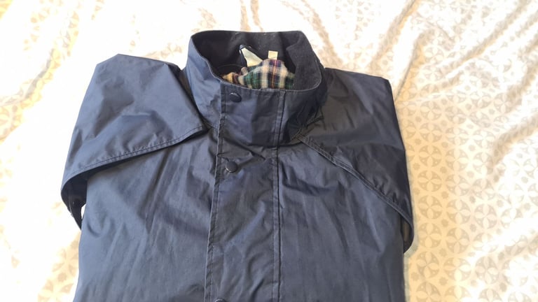 image for Branded Excellent quality heavy duty Raincoat with shoulder cape for extra rainproofing.