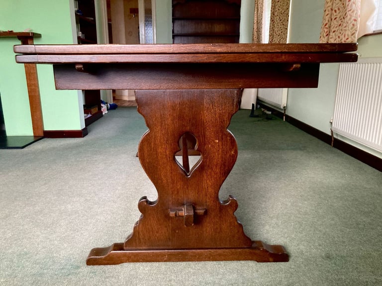 Dark mahogany finish dining table and six chairs