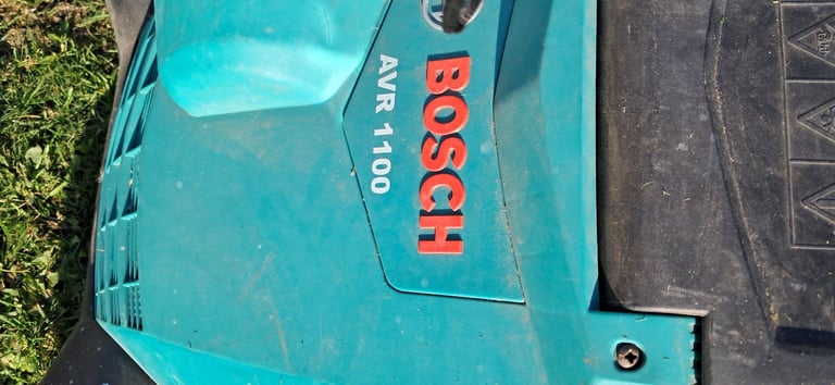 image for Lawn mower and a scarifier
