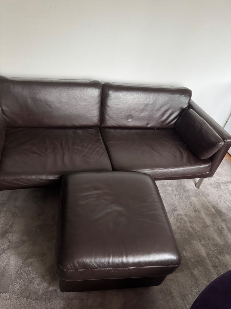2 Seater leather sofa and puffer table 