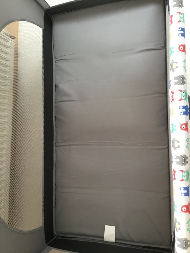 Joie travel cot, with mattress and carrying bag
