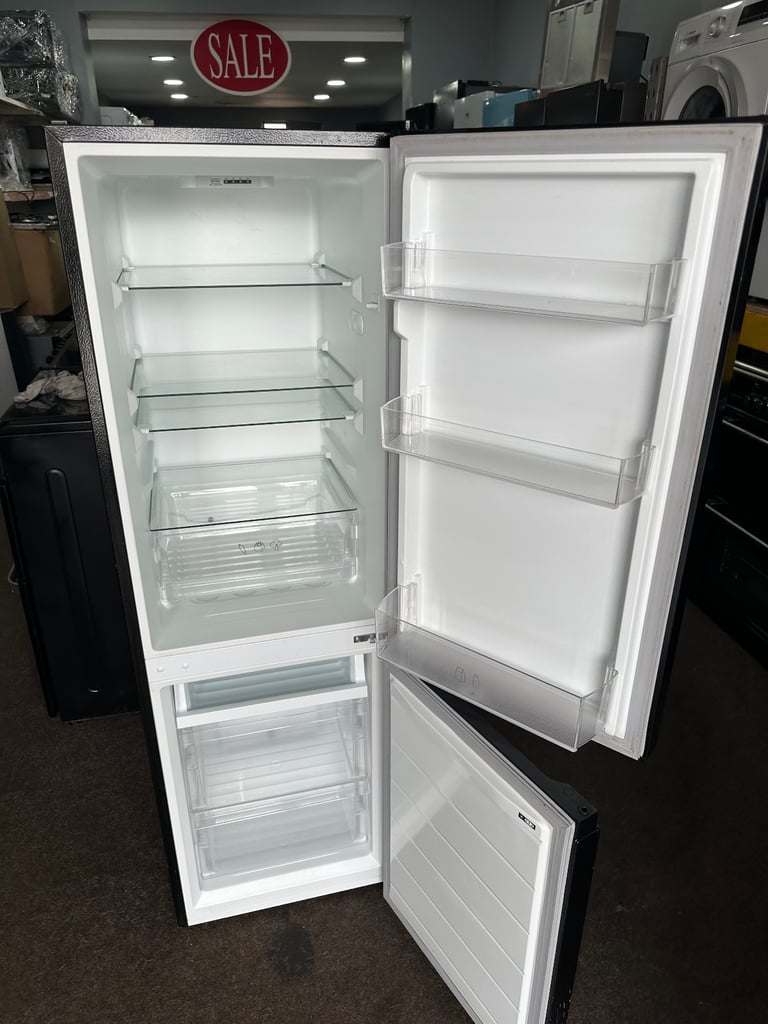 Logik black top condition frost free medium fridge freezer 