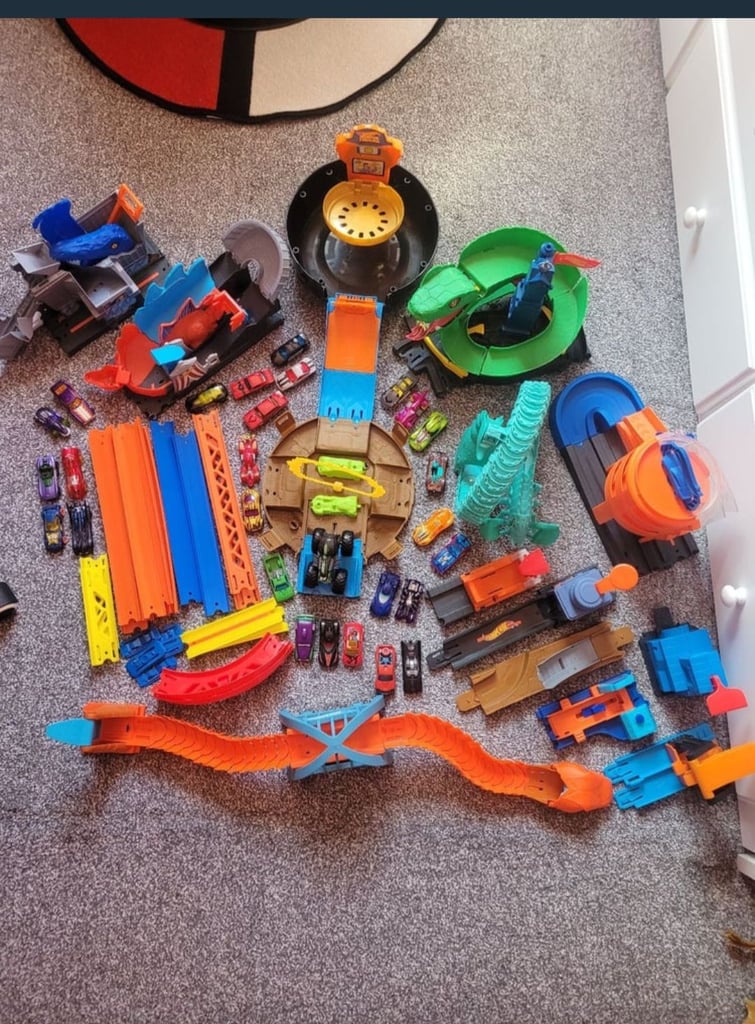 Over 50 pieces assorted toys for sale.