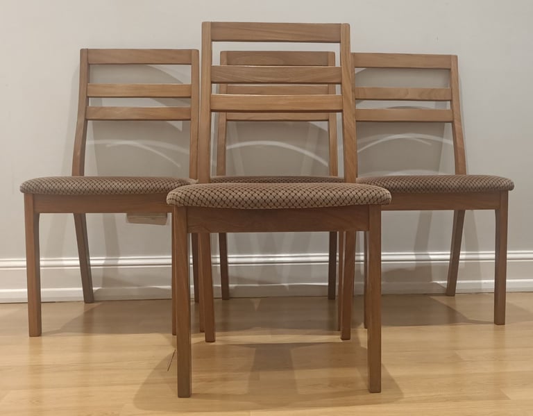 image for A set of four mid century teak Nathan  dining chairs