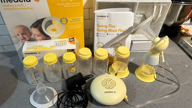 image for Medela swing flex breast pump and microwave steam steriliser
