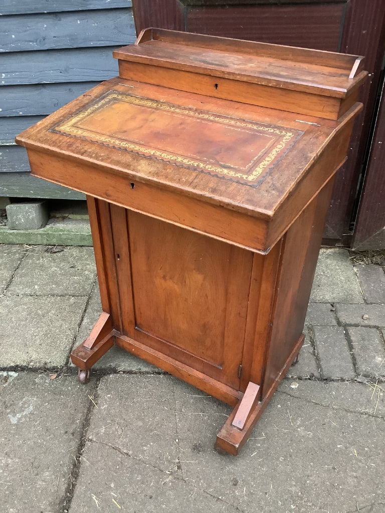 image for Victorian walnut brown leather insert davenport with ink wells & wheel castors