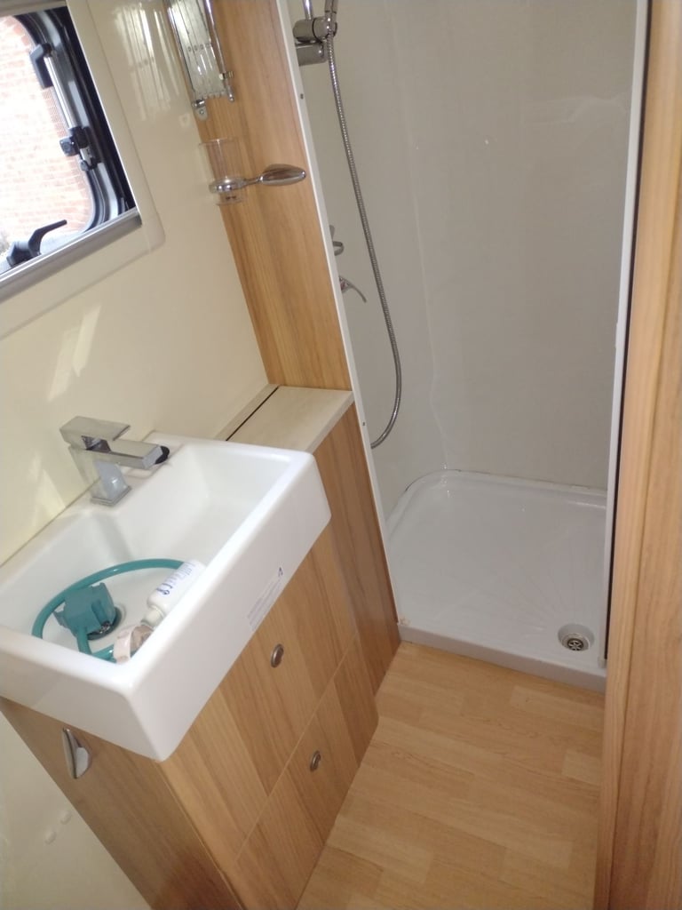 Bailey unicorn Valencia 2012 caravan fixed bed motor mover awning 