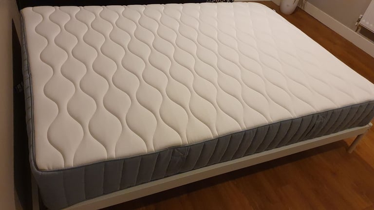 image for Ikea double bed in excellent condition - Vagstranda mattress + Vevelstad bed frame