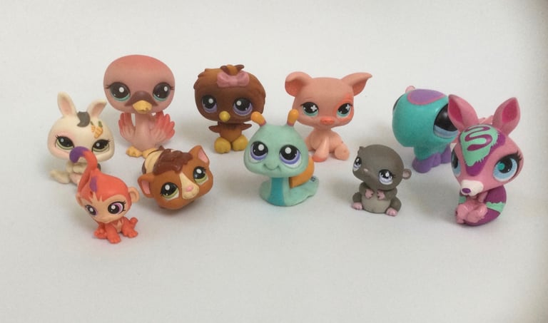 Bundle of Littlest Pet Shop toys includes rare lilac eyes various figures collectible 