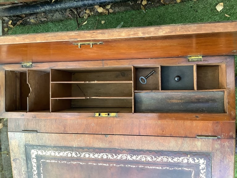 Victorian walnut brown leather insert davenport with ink wells & wheel castors