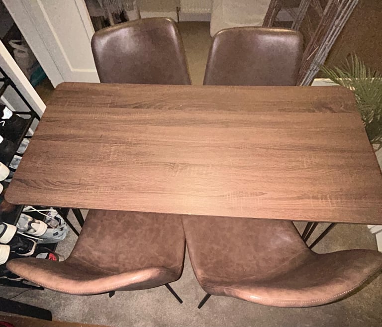 image for Dining table and chairs