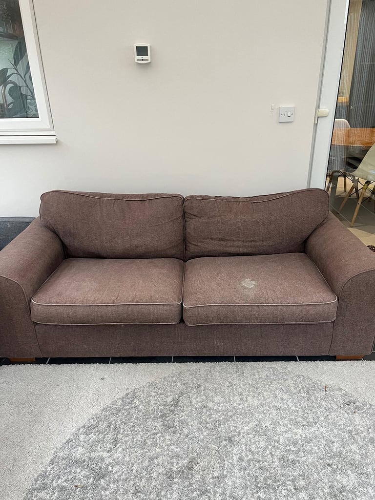 Brown fabric three seater sofa