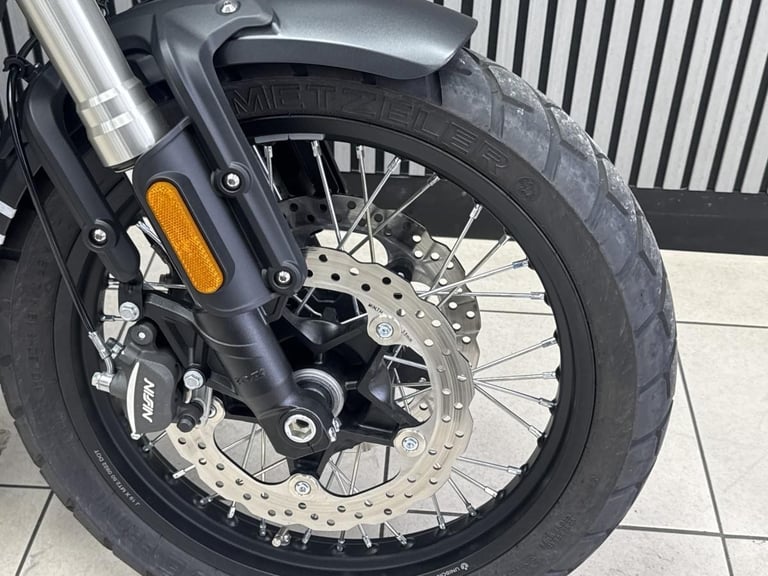 Voge ac525X in grey with yellow decals and only 211 Miles retro adventure