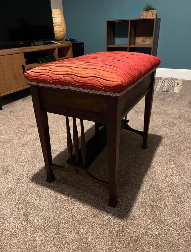 image for Reupholstered piano stool 
