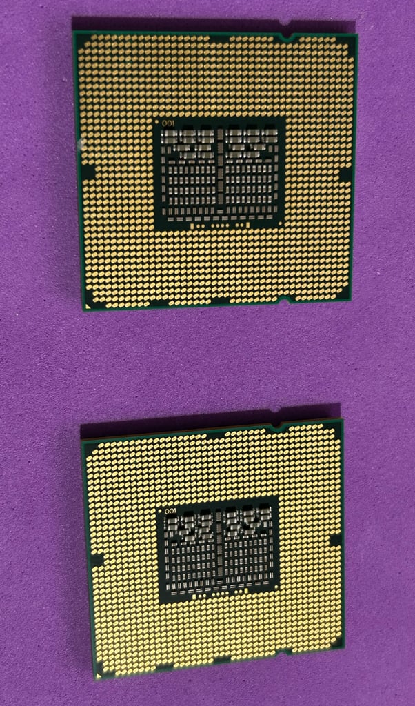 Pair of delidded Xeon E5520 from Mac Pro