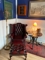 oxblood leather chesterfield Queen Anne wingback chair and foot stool.
