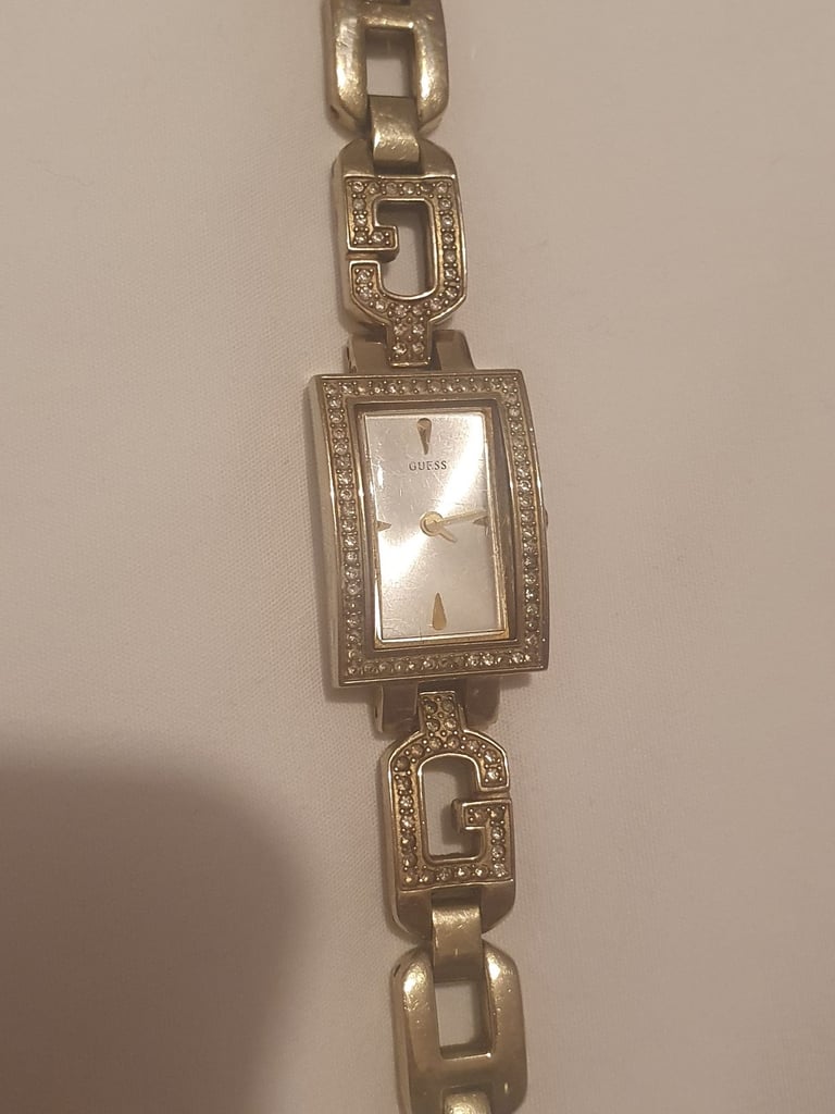 Gold guess watch