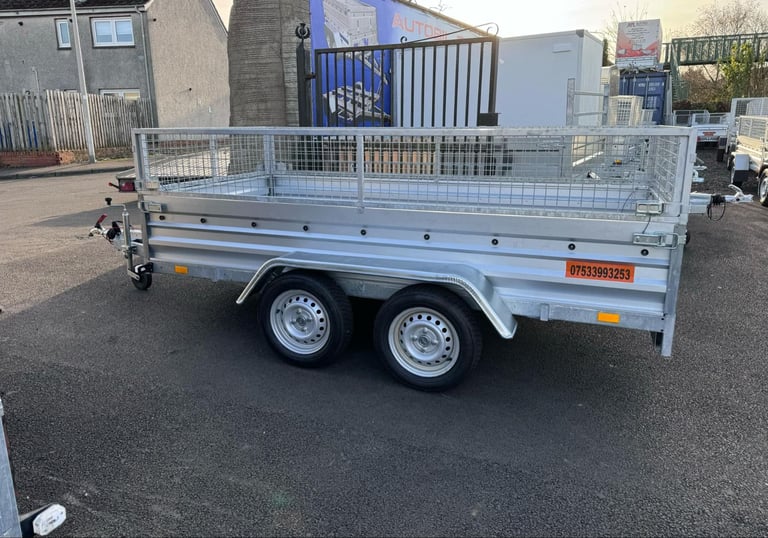 BRAND NEW 10ft x 5ft TWIN AXLE TRAILER WITH 40CM MESH 1300KG BRAKED