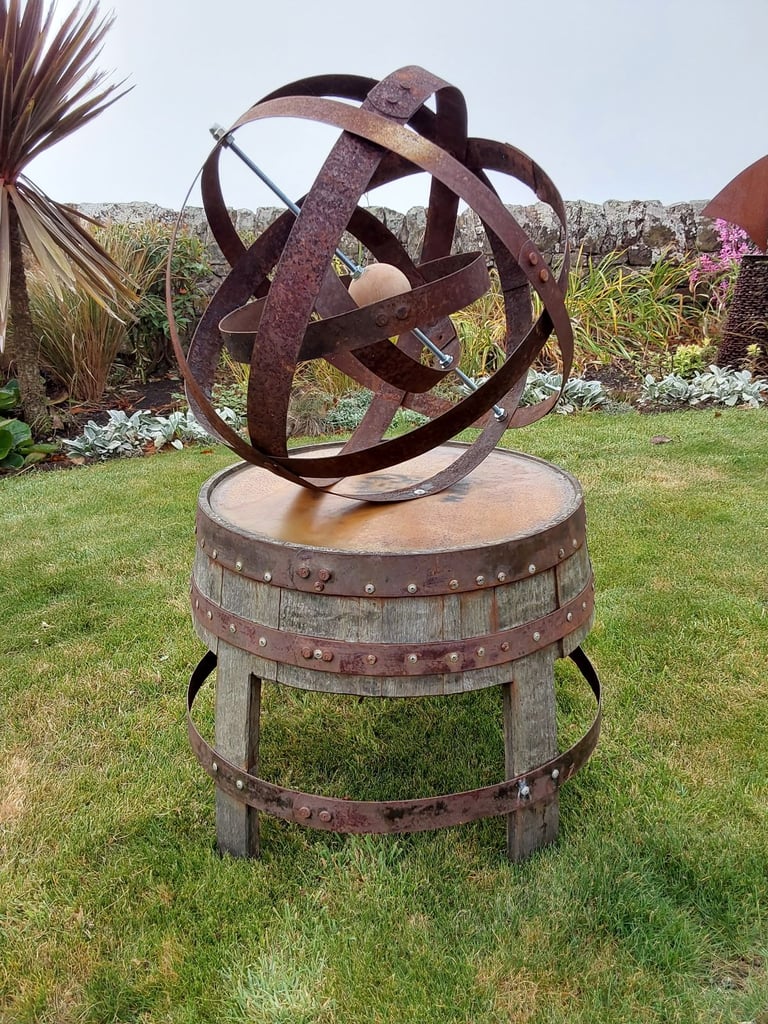 Garden art from whisky barrel materials 