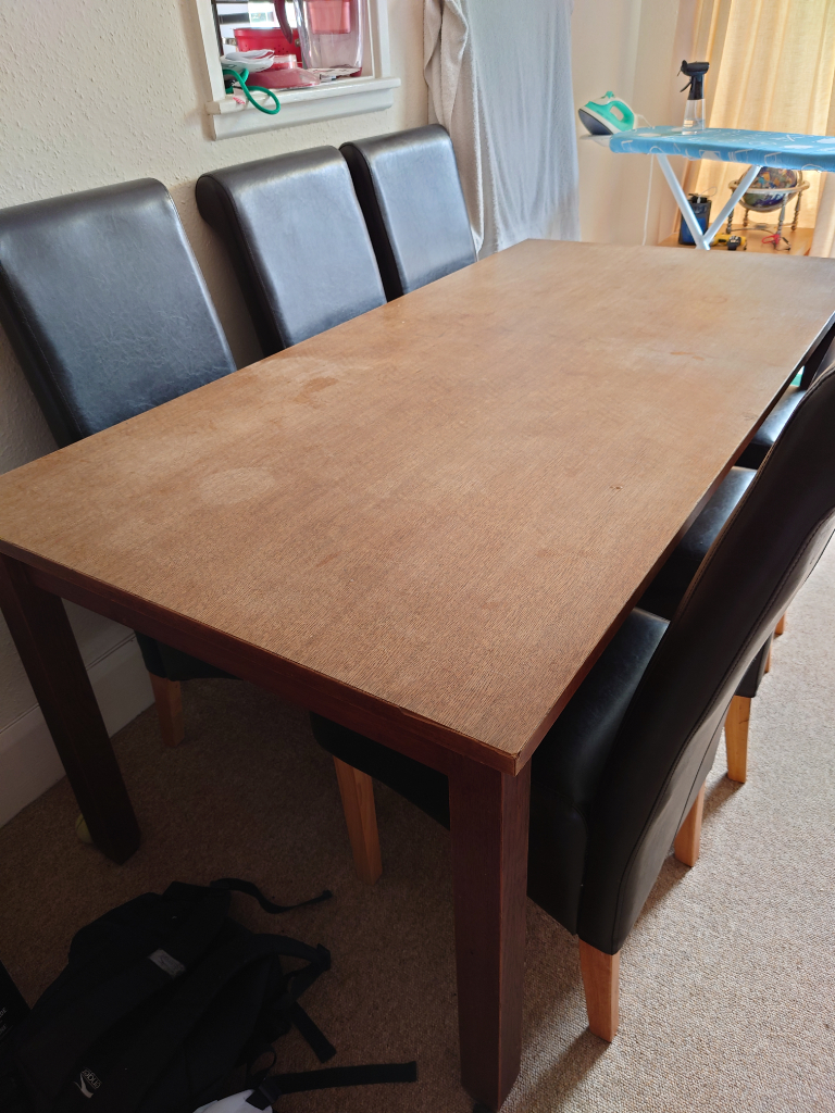 Solid wooden dining table and 6 chairs 