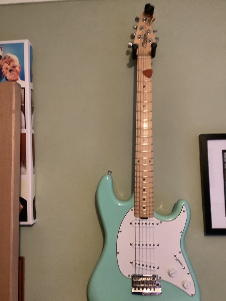 Stirling  Cutlass by music man Guitar