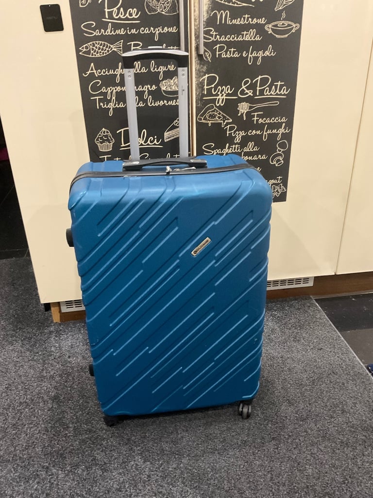 Used suitcase ATLASBAGS size 75x48x£29cm blue 4 wheels v.good condition £28