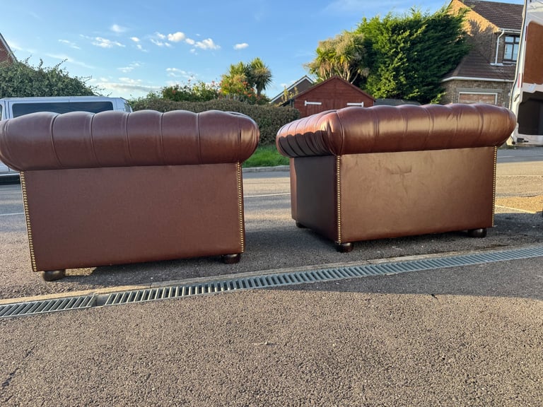 Pair of chesterfield faux brown leather club armchairs 