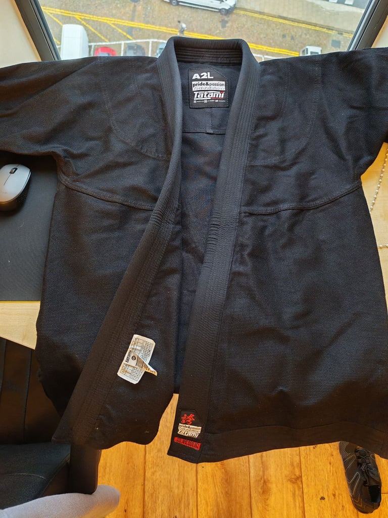 Tatami™  bjj gi with white belt, size A2L, used less than a week.  