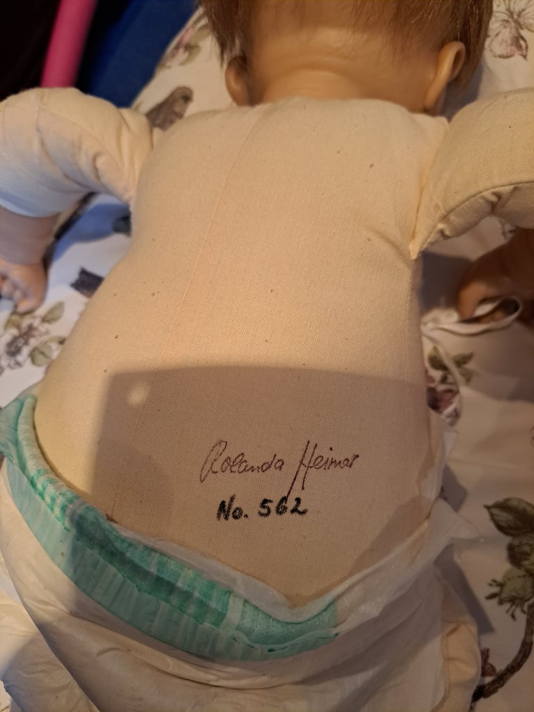 Collectable baby dolls and antique style pram