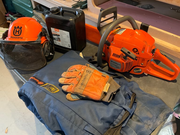 image for Husqvarna 340 chainsaw with complete safety kit.