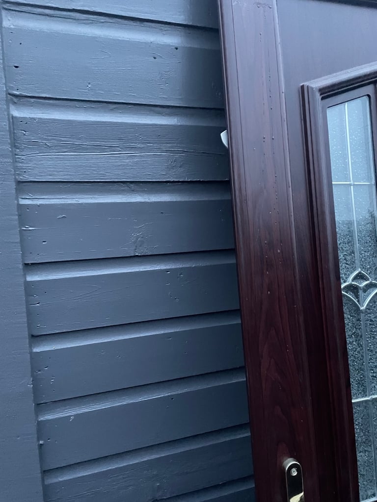 Upvc front door in rosewood 